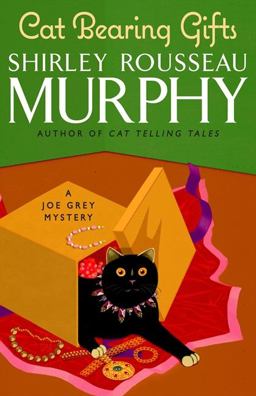 Cat Bearing Gifts A Joe Grey Mystery  9780061806940 Front Cover