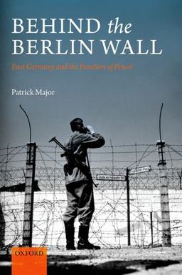 Behind the Berlin Wall East Germany and the Frontiers of Power 2011 9780199605101 Front Cover