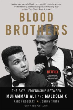 Blood Brothers The Fatal Friendship Between Muhammad Ali and Malcolm X  9780465093229 Front Cover